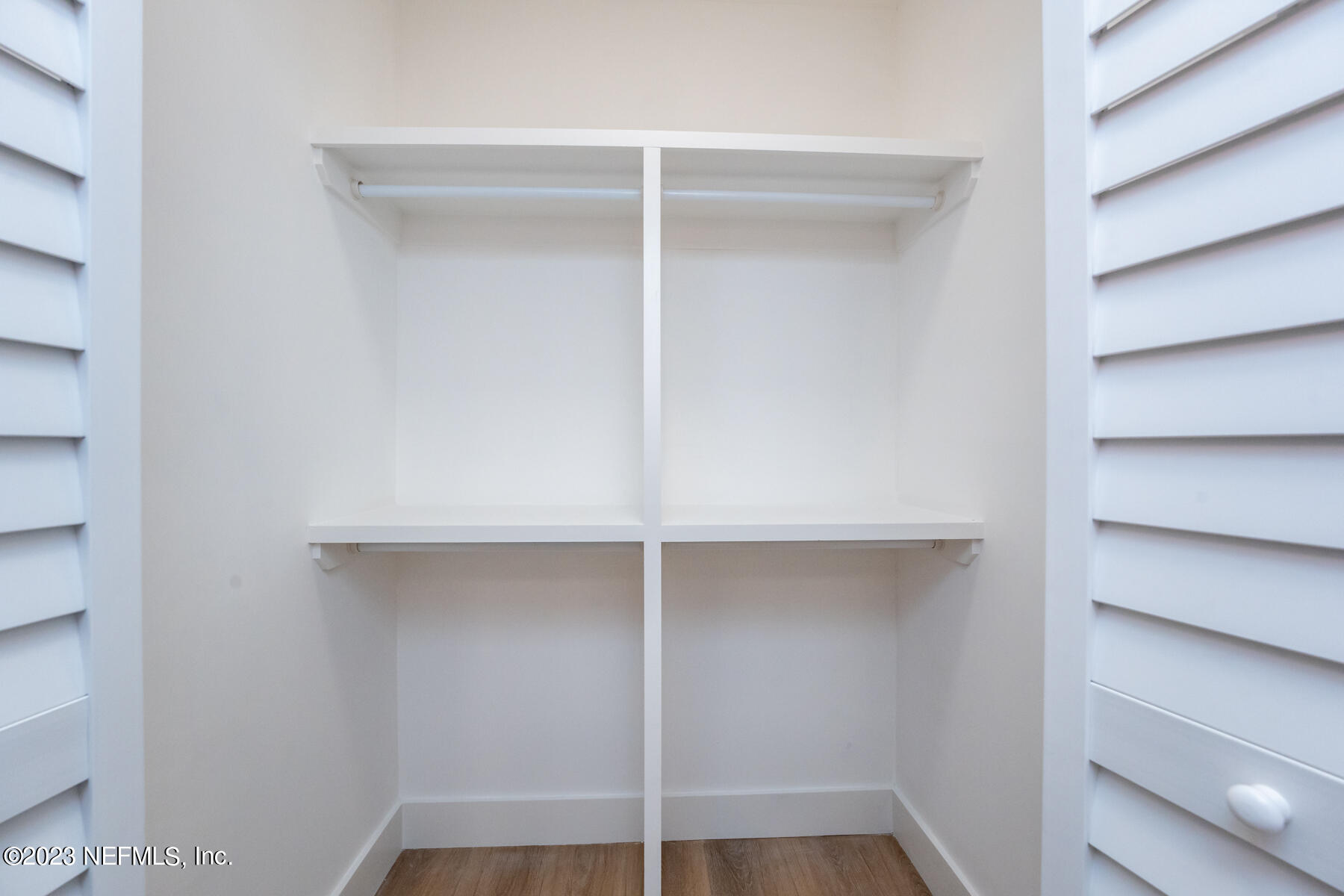 1706 Sunset Drive Jacksonville Beach, FL 32250 - Photo 30 of 44 a view of an empty walk in closet