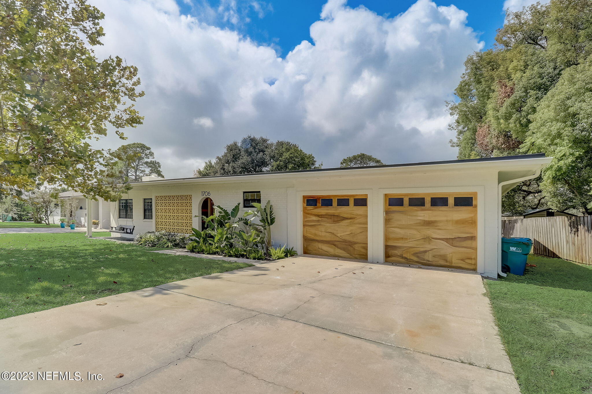 1706 Sunset Drive Jacksonville Beach, FL 32250 - Photo 35 of 44 front view of a house with a yard