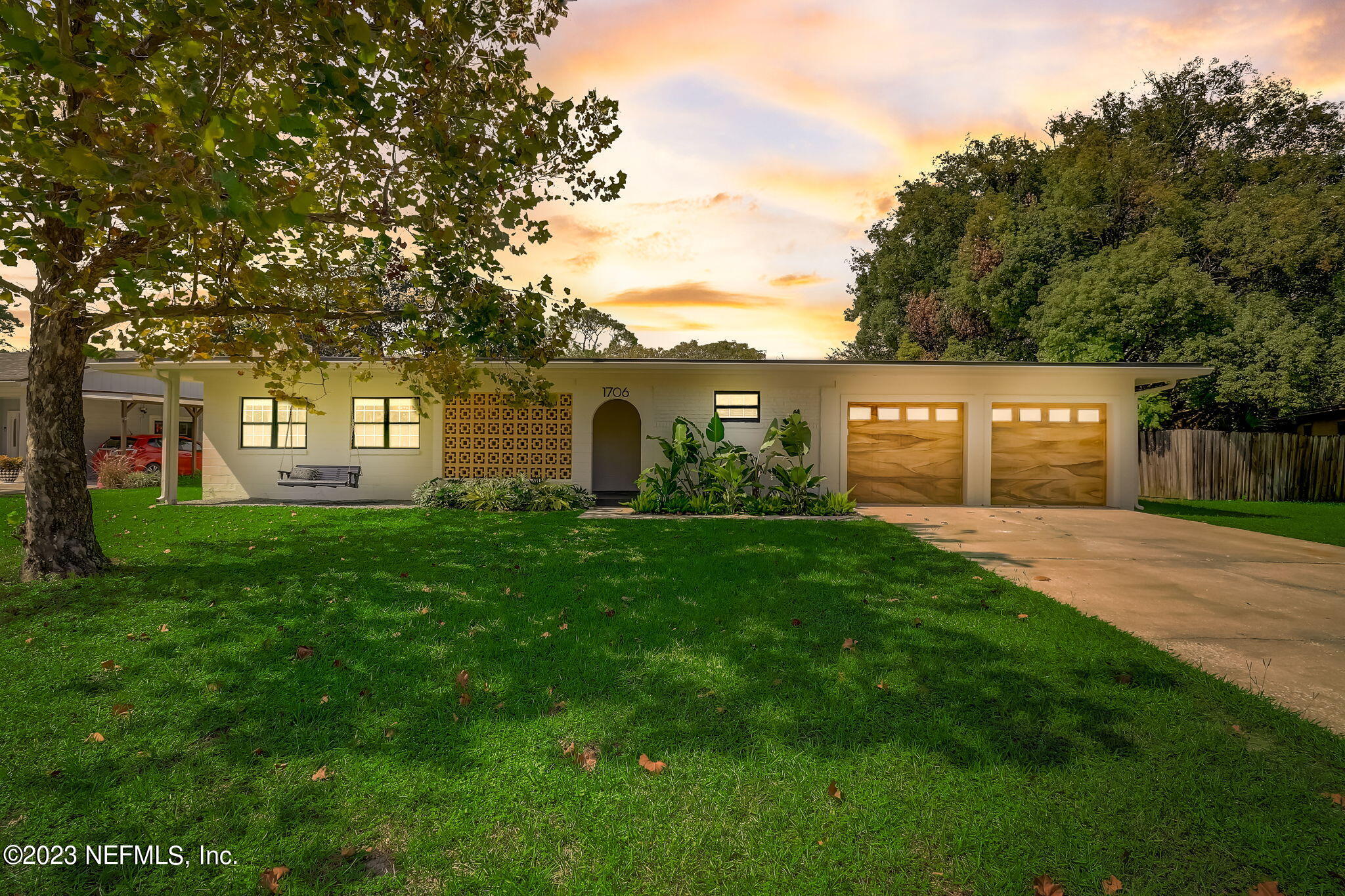 1706 Sunset Drive Jacksonville Beach, FL 32250 - Photo 36 of 44 a view of a house with a backyard