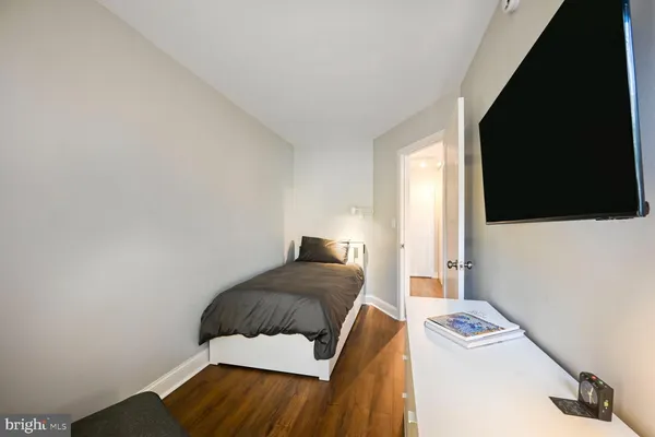 a bathroom with a tub and shower