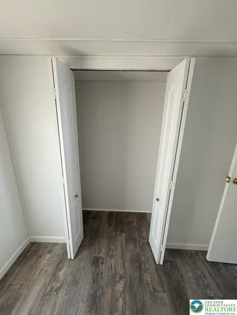 a bathroom with a bathtub and a window