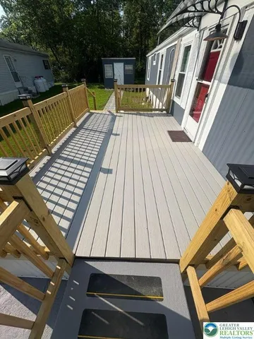 a view of roof deck with patio