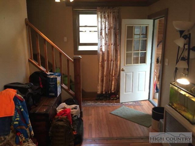 275 Parker Road Creston, NC 28615 - Photo 3 of 31 a view of hallway with furniture and a window