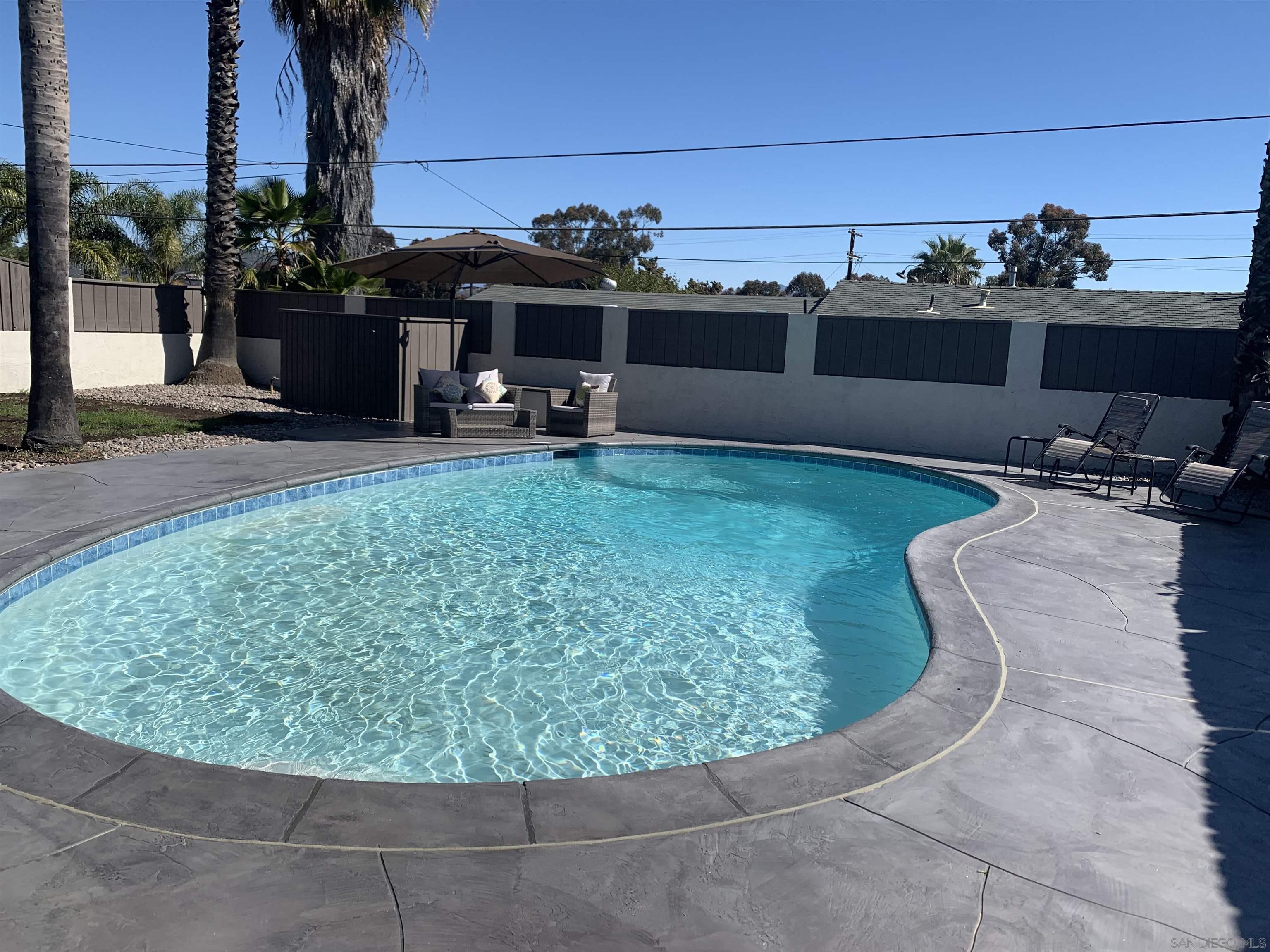 377 El Monte Road El Cajon, CA 92020 - Photo 1 of 19 a view of a terrace with a garden