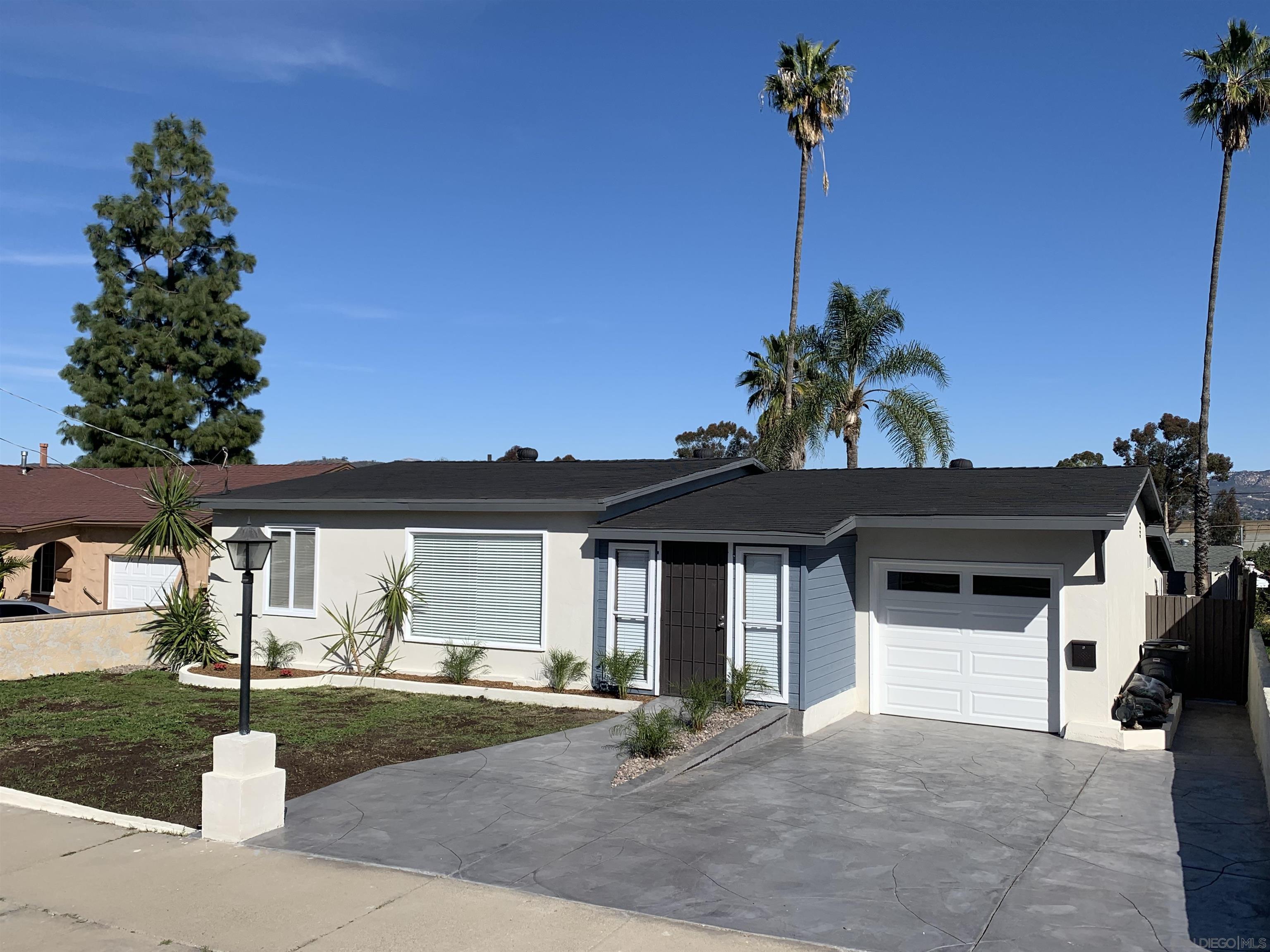 377 El Monte Road El Cajon, CA 92020 - Photo 19 of 19 a front view of a house with garden