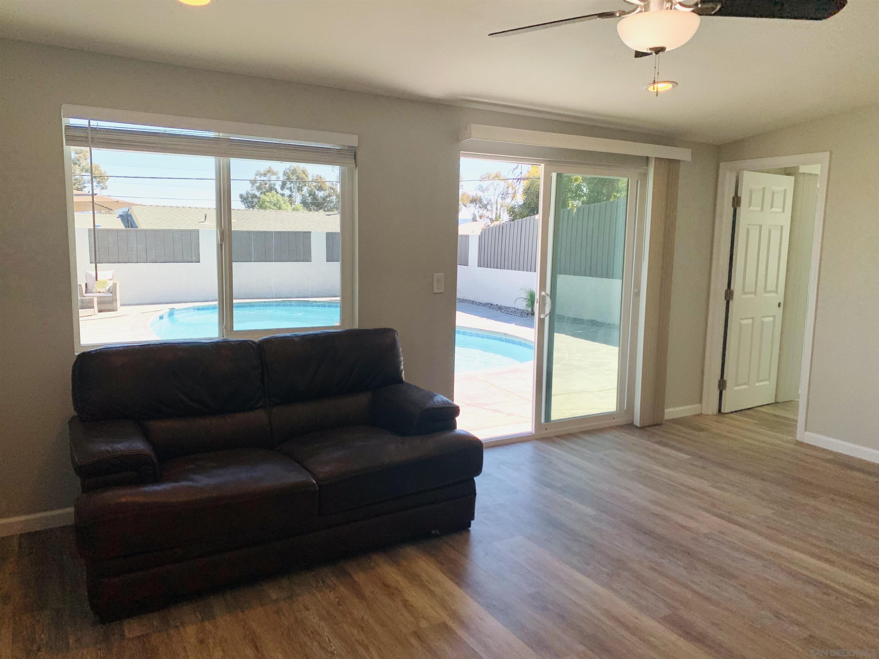 377 El Monte Road El Cajon, CA 92020 - Photo 3 of 19 a living room with furniture and a large window