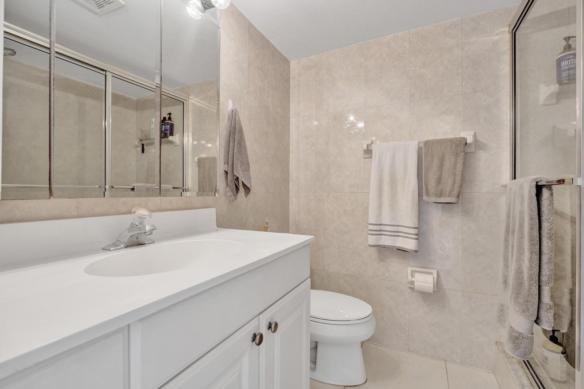 231 East Lantana Road, Unit 204 Lantana, FL 33462 - Photo 15 of 63 a bathroom with a sink toilet and shower