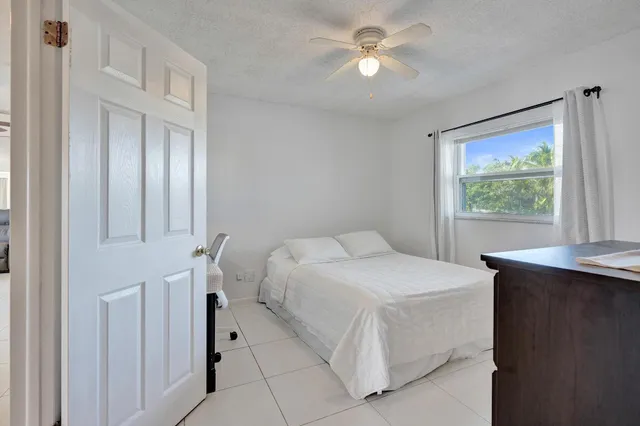a bathroom with a toilet sink and vanity