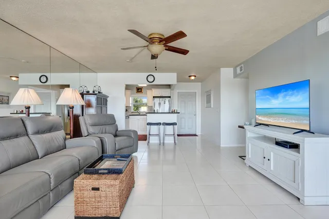 a view of a lake with a building in the background