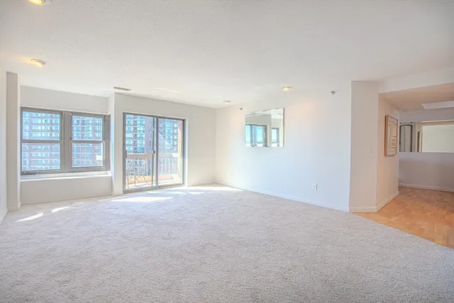 a view of a balcony with chairs