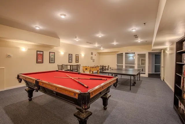 a view of parking garage with cars