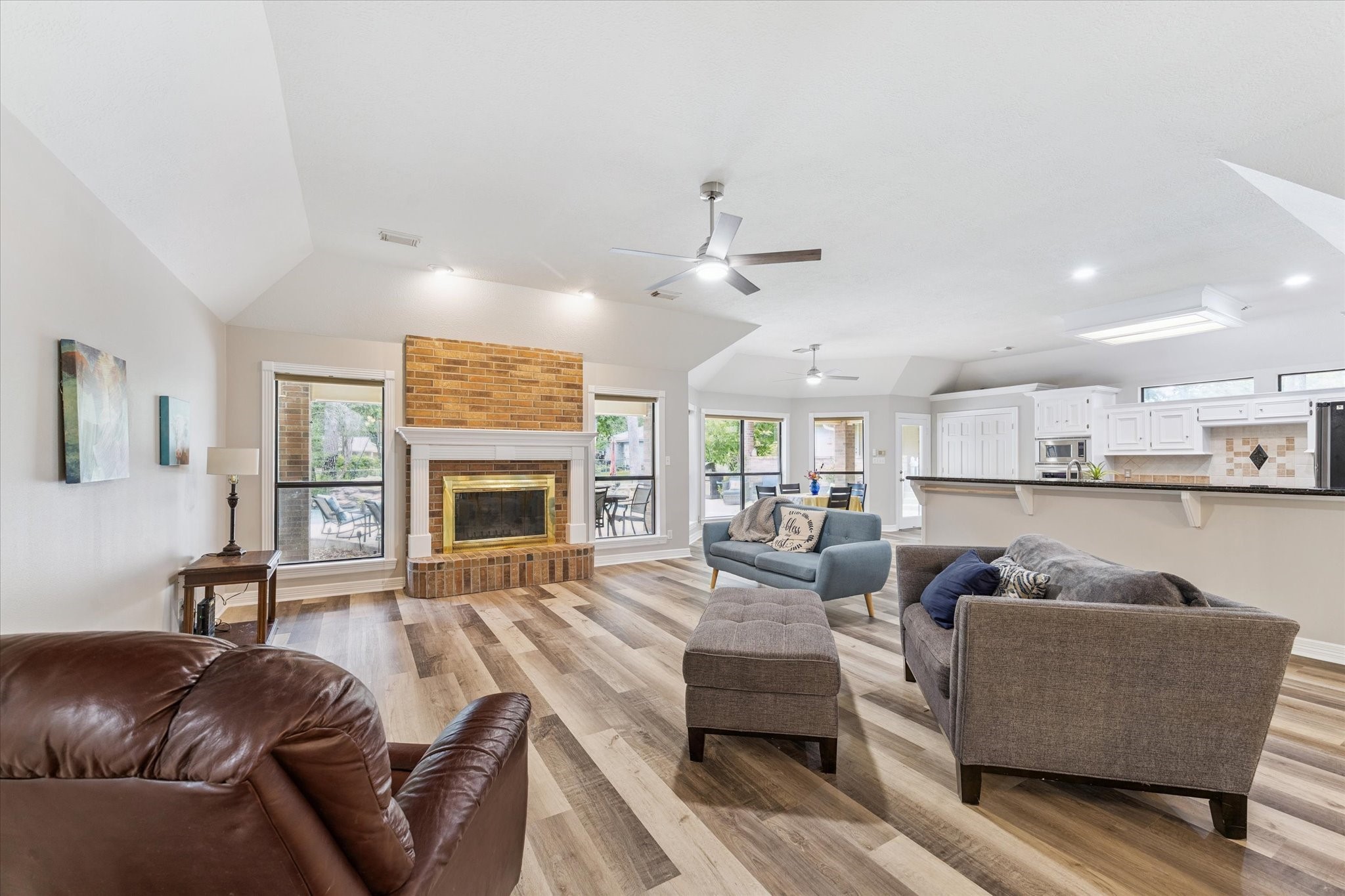 23818 Pin Oak Drive Spring, TX 77389 - Photo 13 of 31 a living room with furniture and a fireplace