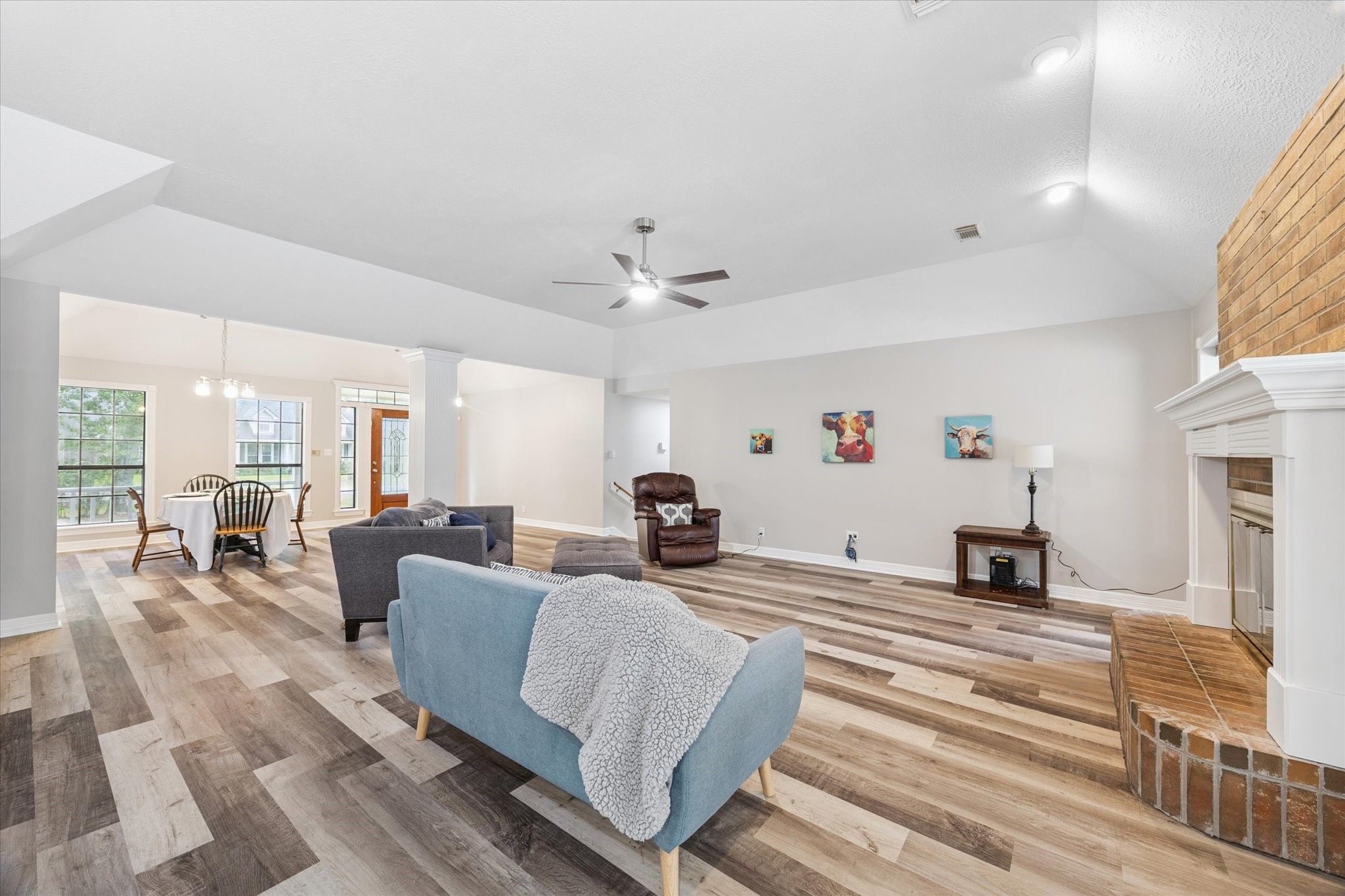 23818 Pin Oak Drive Spring, TX 77389 - Photo 14 of 31 a living room with furniture a fireplace and a large window