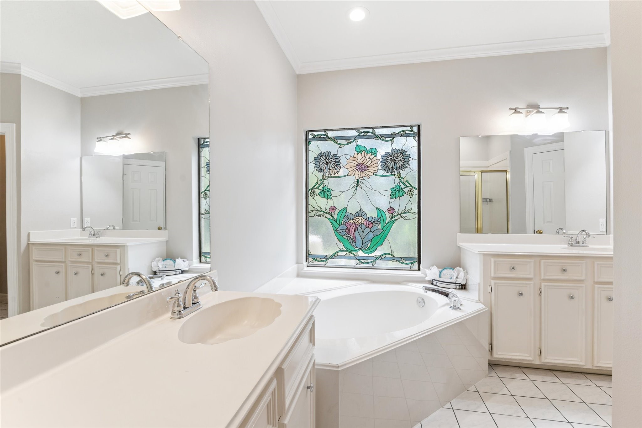 23818 Pin Oak Drive Spring, TX 77389 - Photo 22 of 31 a bathroom with a tub sink and mirror