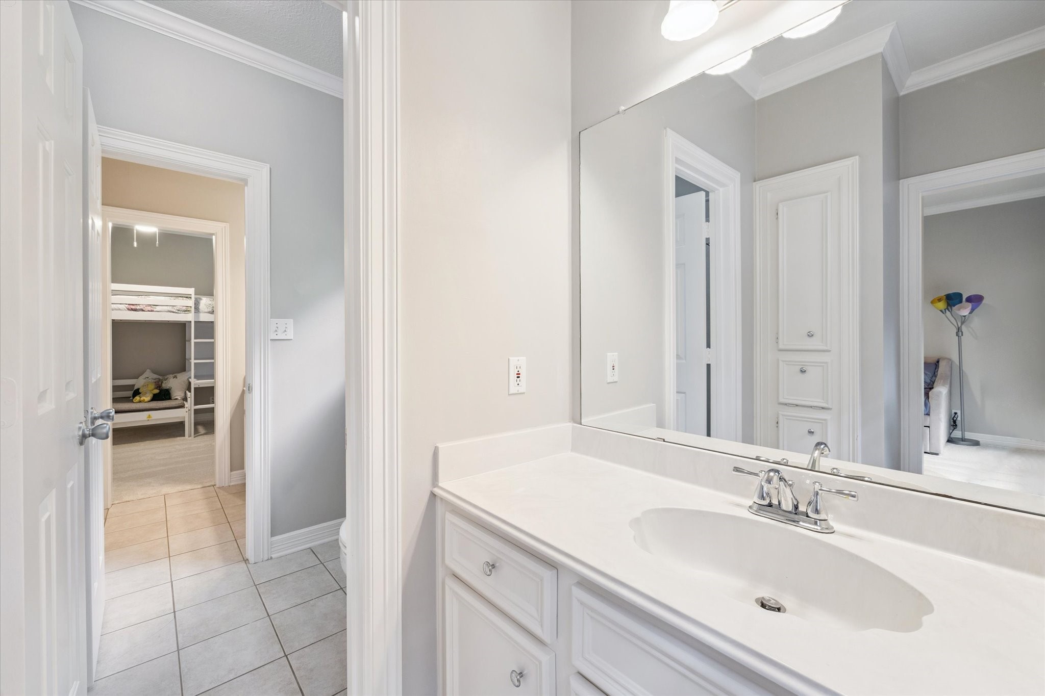 23818 Pin Oak Drive Spring, TX 77389 - Photo 28 of 31 a bathroom with a sink and a mirror