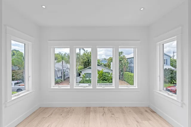 a view of a room that has a window in it