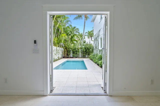 a view of a backyard with plants