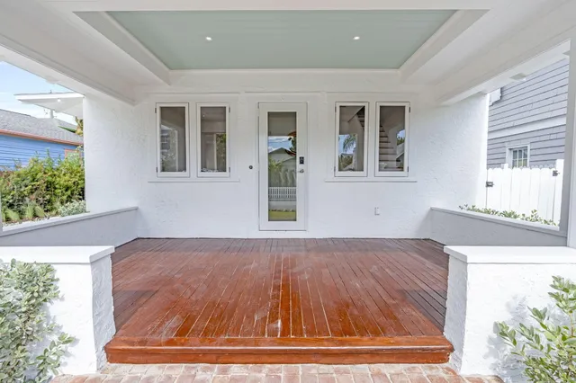 front view of a house with a small yard