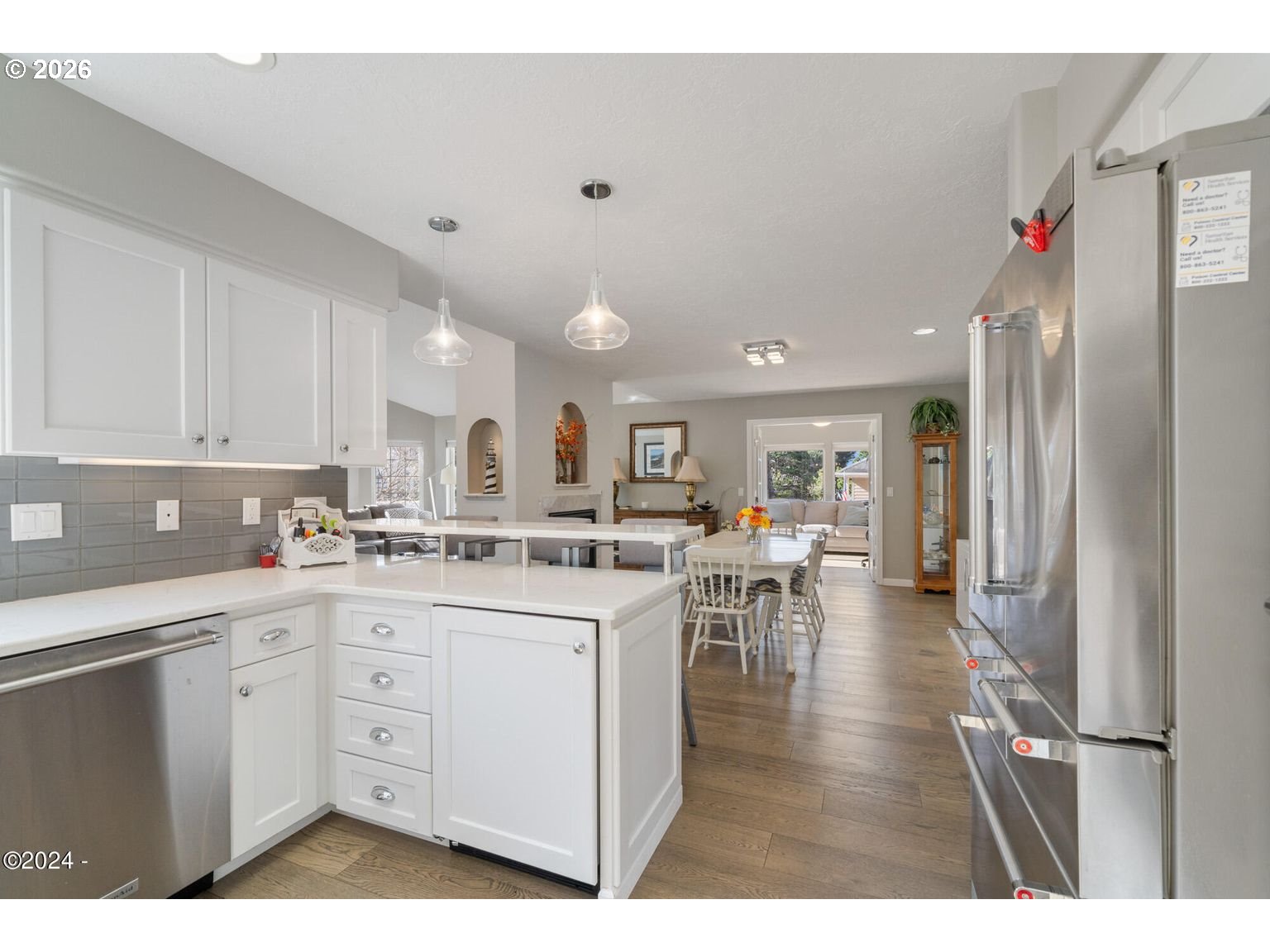 465 Edgewater Depoe Bay, OR 97341 - Photo 12 of 48 a kitchen with white cabinets and sink