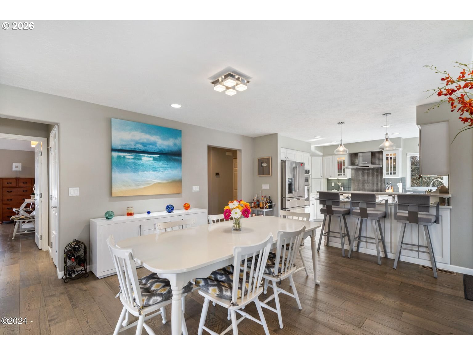 465 Edgewater Depoe Bay, OR 97341 - Photo 15 of 48 a view of a dining room with furniture and wooden floor