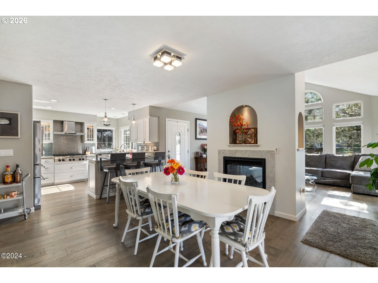 465 Edgewater Depoe Bay, OR 97341 - Photo 16 of 48 a view of a dining room with furniture wooden floor and a rug