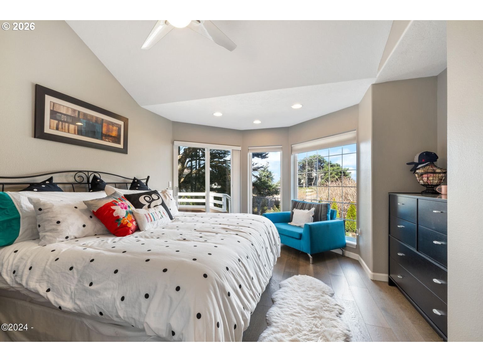 465 Edgewater Depoe Bay, OR 97341 - Photo 22 of 48 a bedroom with a bed and a large window