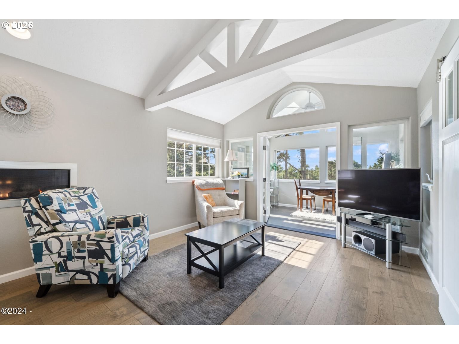 465 Edgewater Depoe Bay, OR 97341 - Photo 33 of 48 a living room with furniture and a flat screen tv