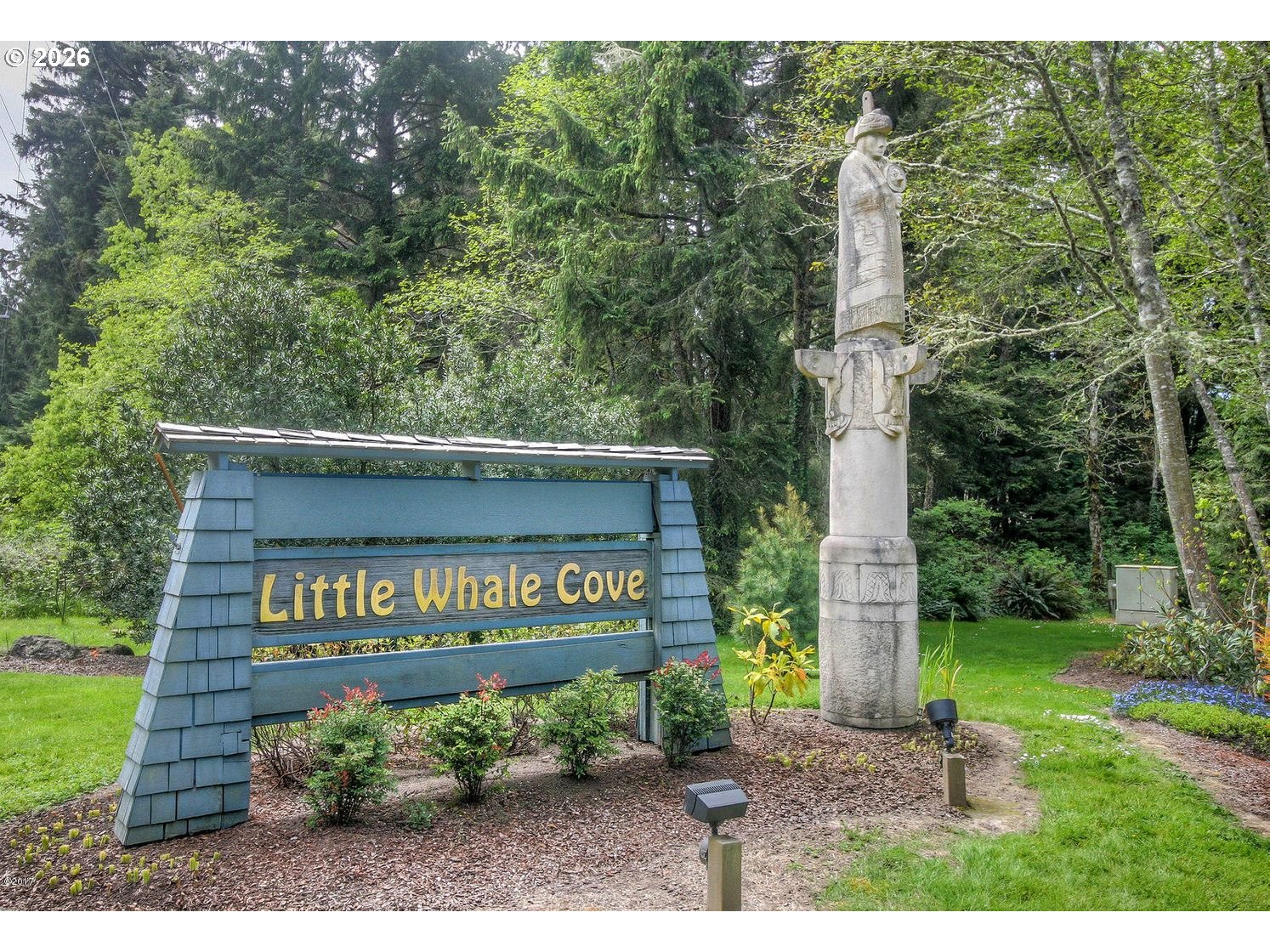 465 Edgewater Depoe Bay, OR 97341 - Photo 40 of 48 a sign board with a park bench