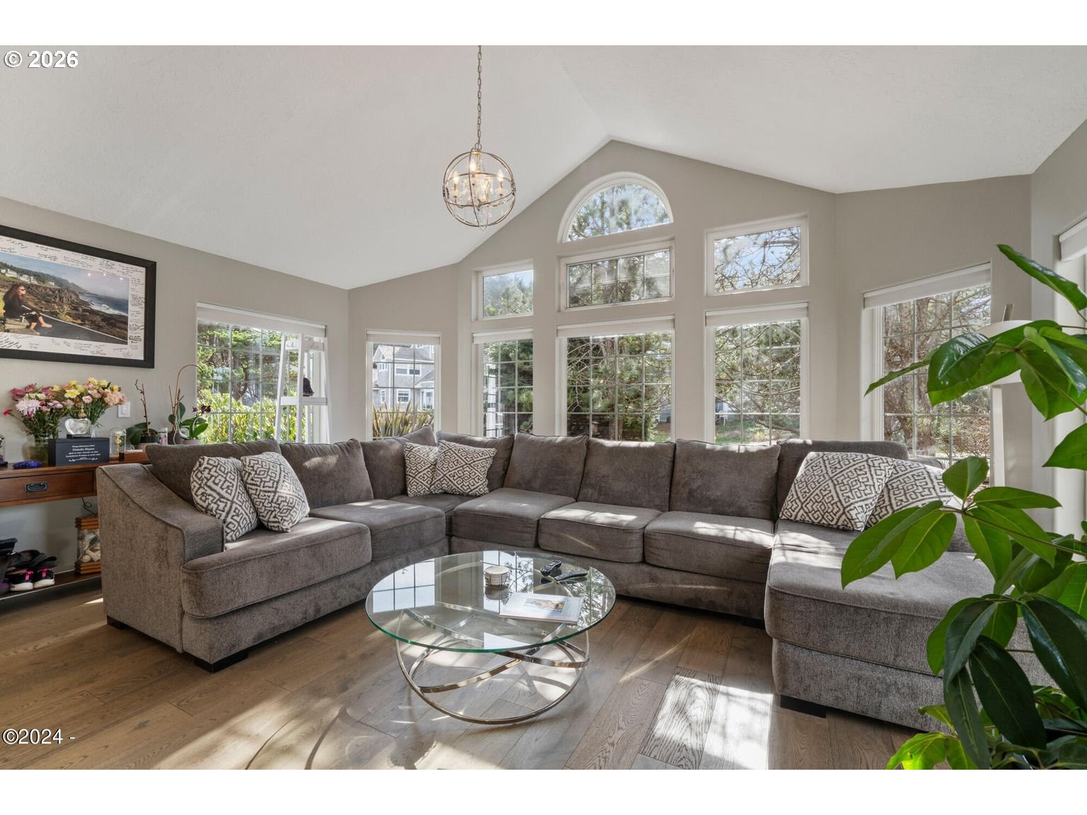 465 Edgewater Depoe Bay, OR 97341 - Photo 4 of 48 a living room with furniture a large window and a clock