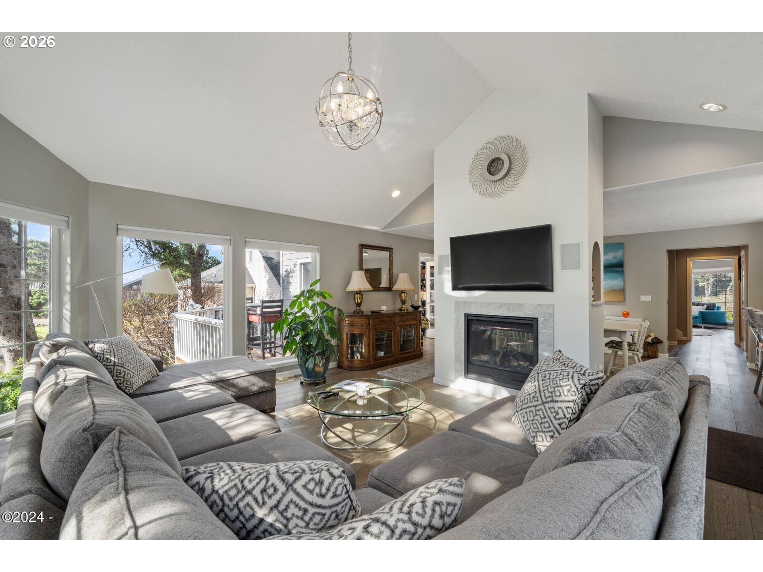 465 Edgewater Depoe Bay, OR 97341 - Photo 6 of 48 a living room with furniture a fireplace and a flat screen tv