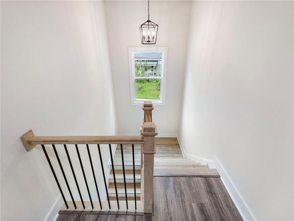 490 Jackson Street Buford, GA 30518 - Photo 21 of 46 a view of a hallway with windows