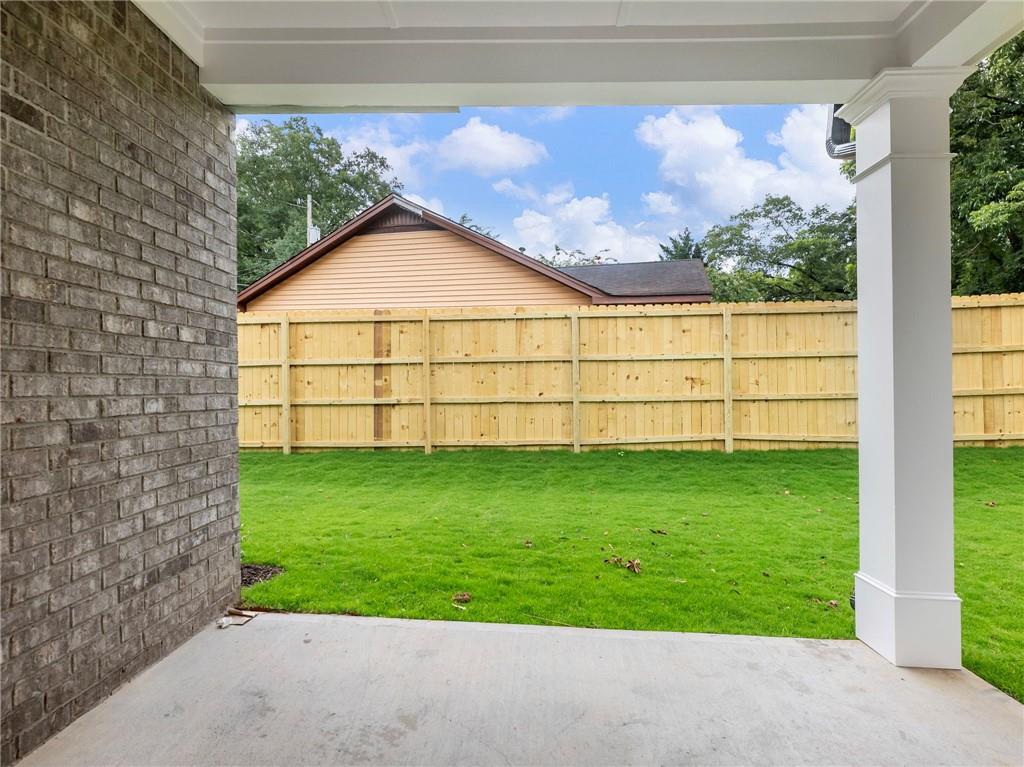 490 Jackson Street Buford, GA 30518 - Photo 44 of 46 a view of a backyard with a garden