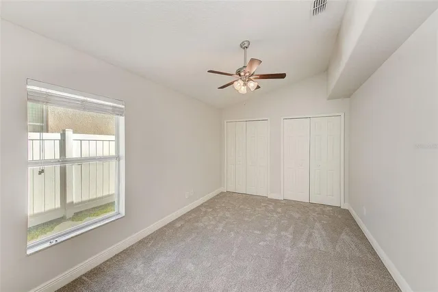 a bathroom with a toilet and bathtub