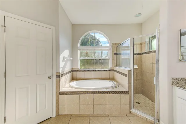 a room with a bed and a stove