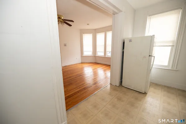a view of livingroom with furniture and window