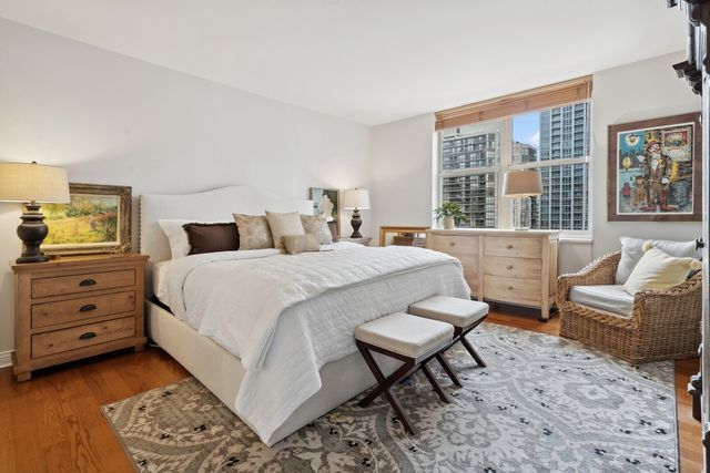 a bedroom with a bed and a couch