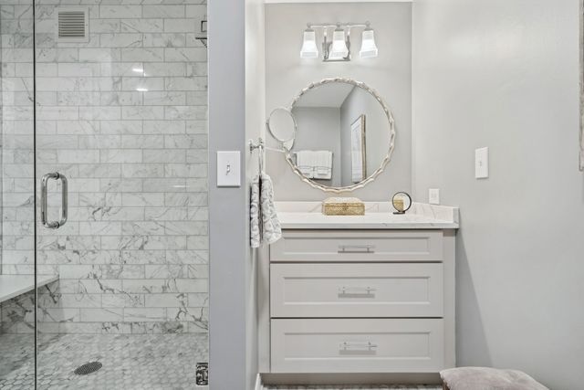 a bathroom with a mirror