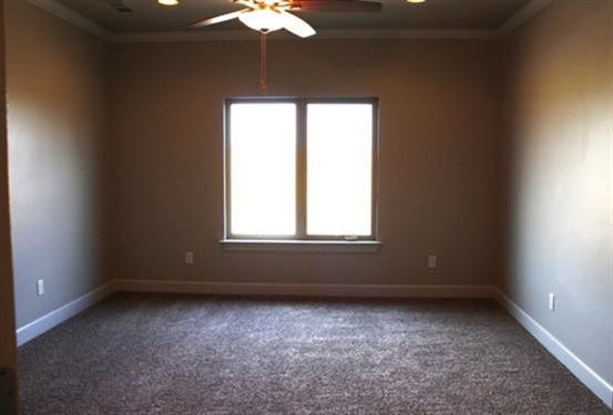10306 Iola Lubbock, TX 79424 - Photo 8 of 10 an empty room with a window
