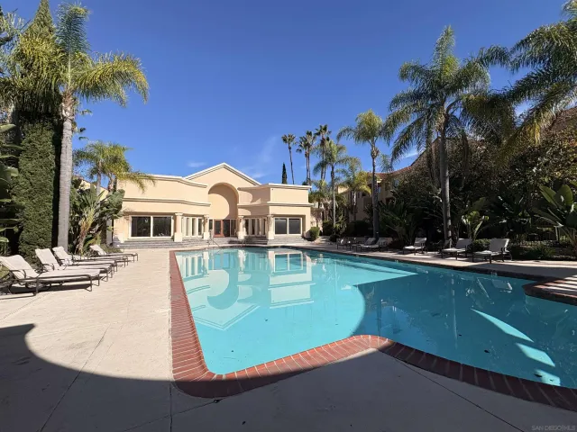 a front view of a house with swimming pool