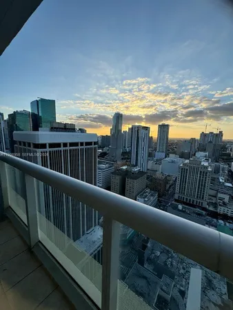 a view of roof deck with city view
