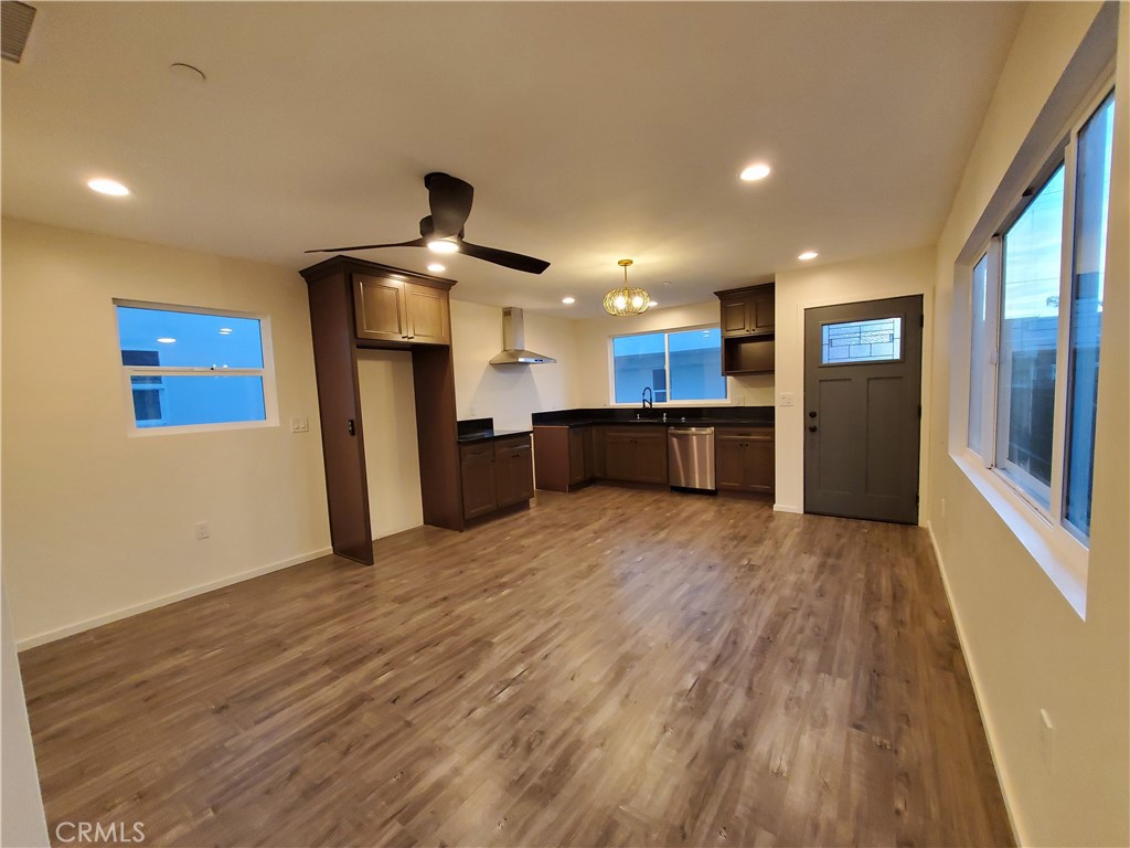 2526 Delaware Street Huntington Beach, CA 92648 - Photo 2 of 6 a view of a kitchen with a sink and a refrigerator