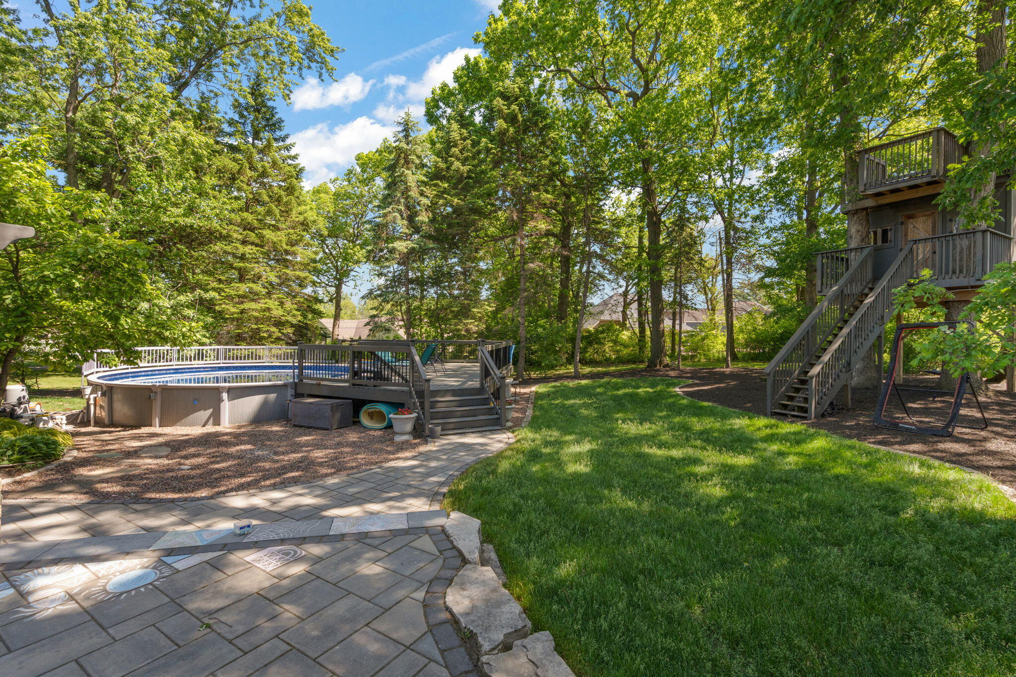 11728 Monroe Place Crown Point, IN 46307 - Photo 27 of 44 a view of backyard with sitting area