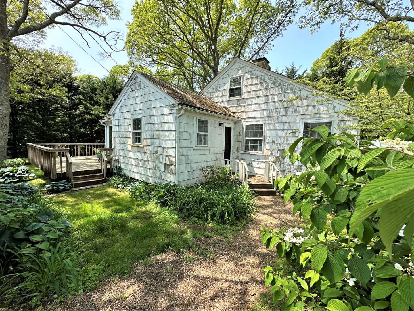 45 Pine Tree Lane Vineyard Haven, MA 02568 - Photo 4 of 25 a front view of house with yard and seating area