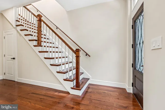 a view of entryway with wooden floor