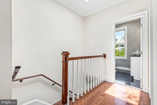 a view of entryway with wooden floor