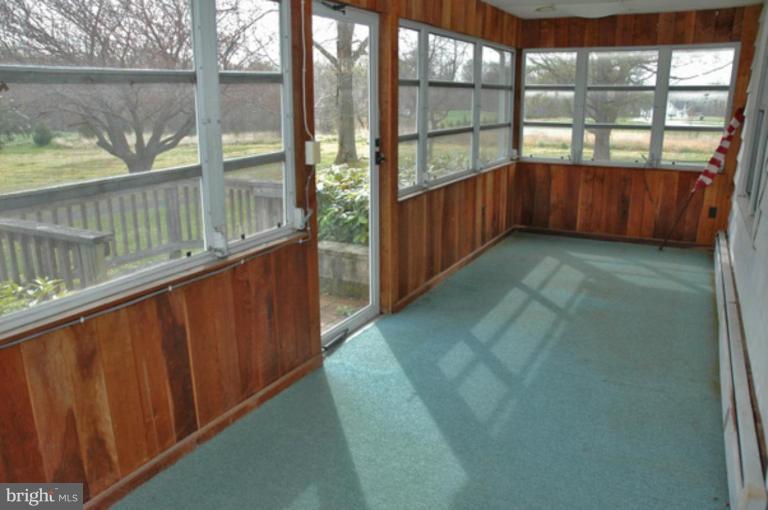 240 Bowie Shop Road Huntingtown, MD 20639 - Photo 8 of 10 Enclosed Front Porch
