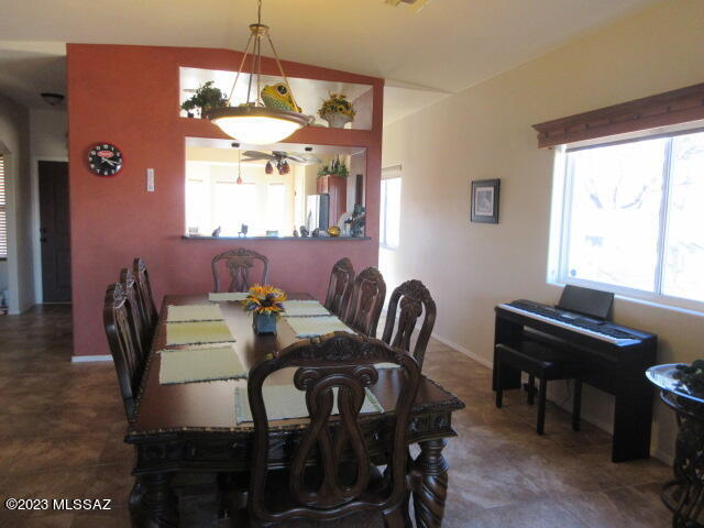 511 Camino Hombre De Oro Rio Rico, AZ 85648 - Photo 30 of 44 a view of a dining room with furniture window and outside view