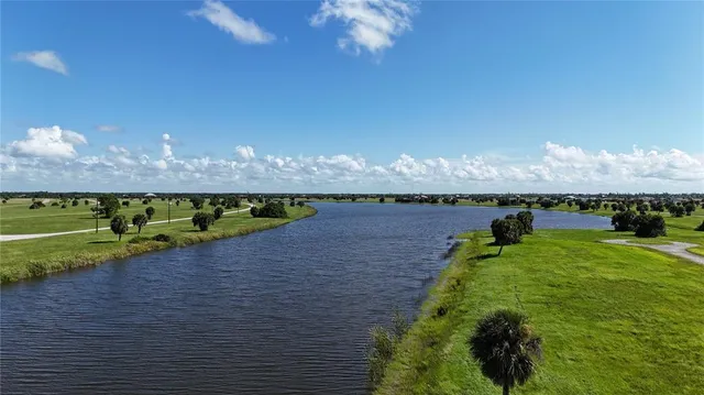 a view of swimming pool with a yard