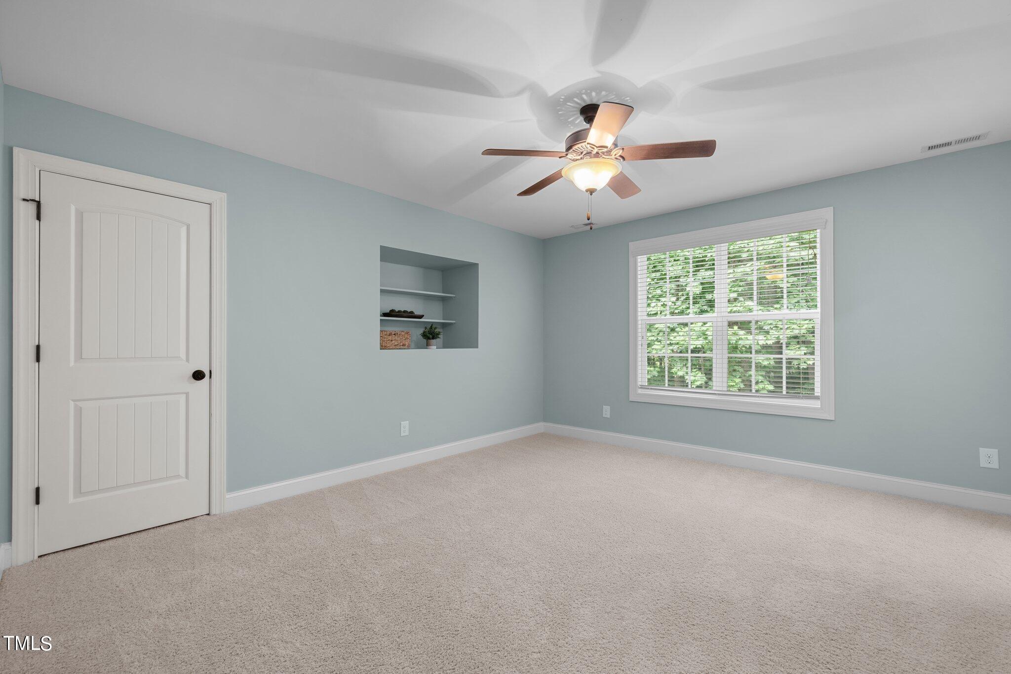 152 Roads End Pittsboro, NC 27312 - Photo 27 of 58 a view of an empty room with a window