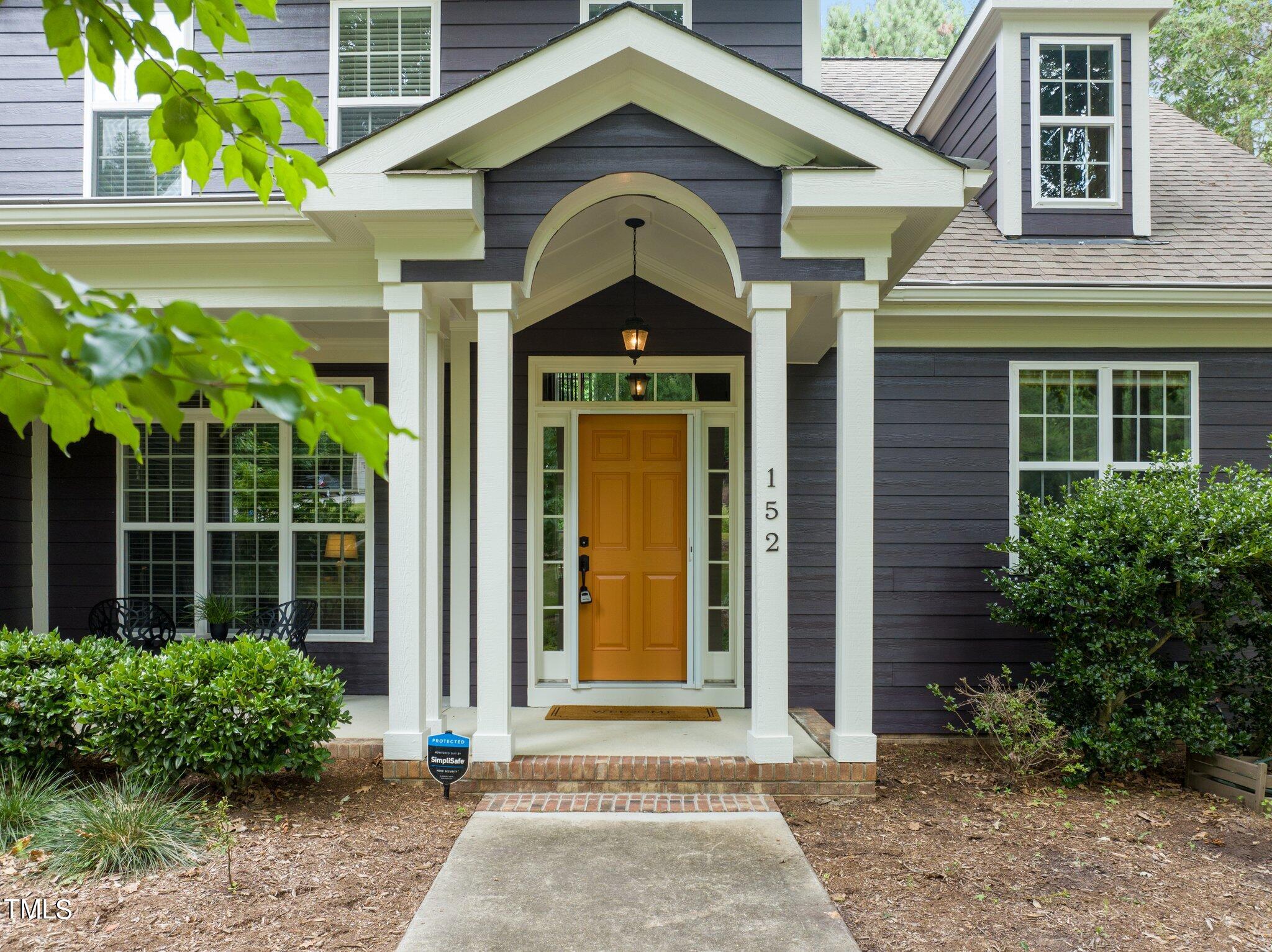 152 Roads End Pittsboro, NC 27312 - Photo 3 of 58 a front view of a house with a yard
